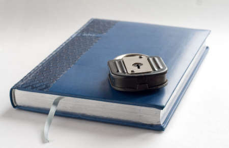 Information Security notepad with lock and silver penの写真素材