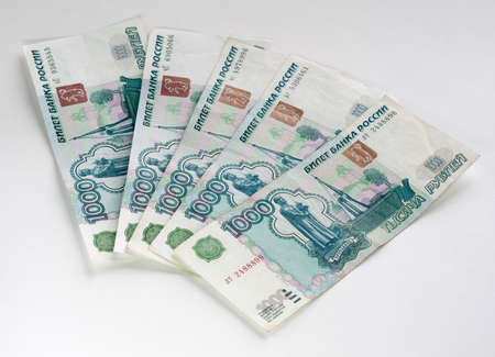 several  of russian rubles on light background