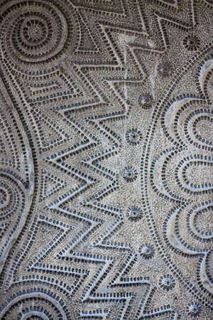 Silver background with hand coining ornament close-up.の写真素材