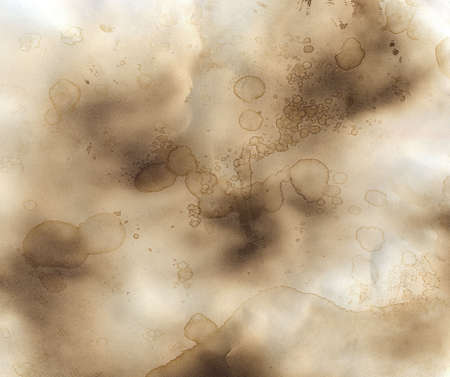 Old burnt paper grunge background with splashの写真素材