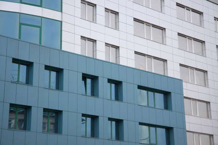 corporate building with windows, Grey and green wall