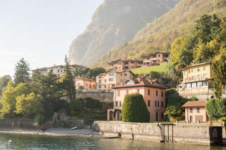 Lake Como, Italy - October 27, 2017: Houses on Shoreline of Lake Como, Italy.