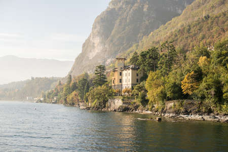 Lake Como, Italy - October 27, 2017: Houses on Shoreline of Lake Como, Italy.