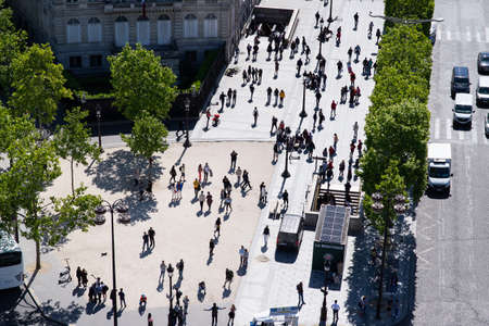 Paris. France - May 15, 2019: Crowd of Pedestrians on Avenue des Champs Elysees. View from Arc de Triomphe in Paris. France.のeditorial素材