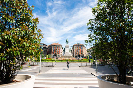 Milan. Italy - May 21, 2019: Back View of Giuseppe Garibaldi Monument in Milan. Cairoli Square. Entrance on Street Via Dante. Crosswalk.のeditorial素材