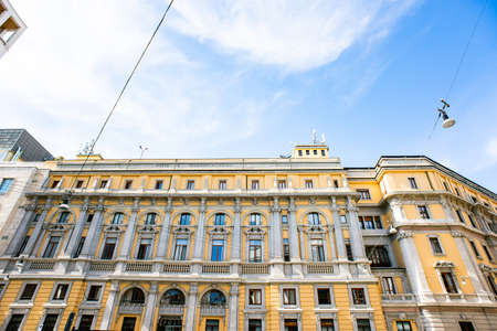 Milan. Italy - May 21, 2019: Old Building on Piazza Tommaso Edison in Milan. Yellow Facade.