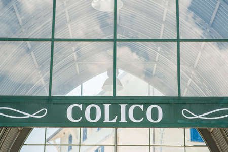 Colico. Lake Como. Italy - July 21, 2019: Ferry Pier in the Commune of Colico. Lombardy. Signboard with Name of the City.のeditorial素材