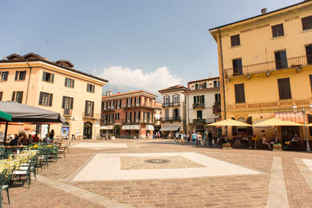 Menaggio. Italy - July 23, 2019: Square in Historic Center of Menaggio on Como Lake. Cafe, Restaurants and Souvenir Shops.のeditorial素材