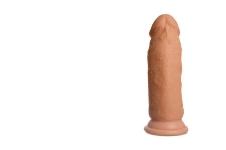 Wet realistic dildo isolated on whiteの写真素材