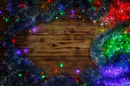 Christmas rustic background - vintage planked wood with lights and free text spaceの写真素材