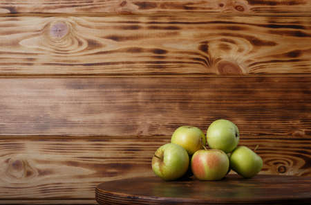 apples on wooden background