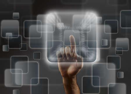 Man's hand pushing the button. Touchscreen. Rear view.の写真素材