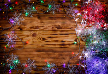 Christmas rustic background - vintage planked wood with lights and free text spaceの写真素材