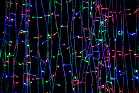 LED electric Christmas lights on dark background