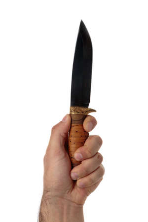 Male hand with a hunting knife isolated on whiteの写真素材