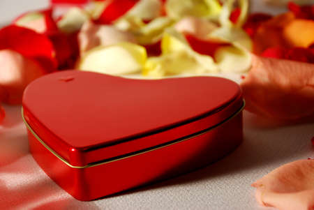 Heart shape box on flower petals for valentines day