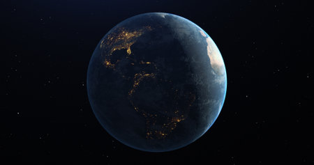 Blue planet earth in dark space. Half of the planet is illuminated, the other is the dark side.の写真素材