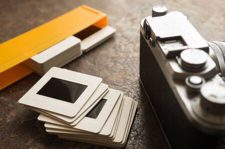 Old camera and slide mountの写真素材
