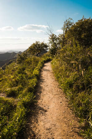 Mountain path of the setting sunの写真素材