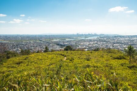 Town overlooking from hillの写真素材
