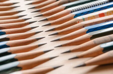 Many pencils facing each otherの写真素材