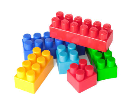 Toy color bricks on white background. Isolated.