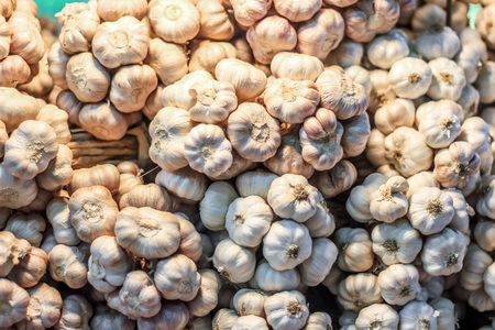 Plenty of garlic at the market for sellの写真素材