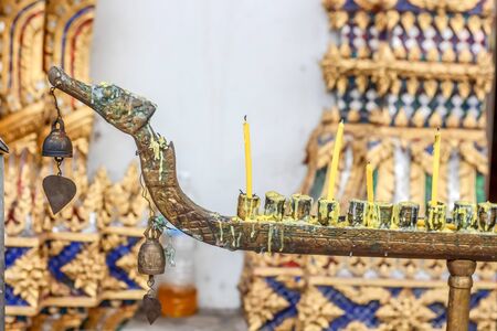 Thai style candlestick holder used in templeの写真素材
