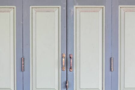 old classic Thai style close vintage wood doorの写真素材