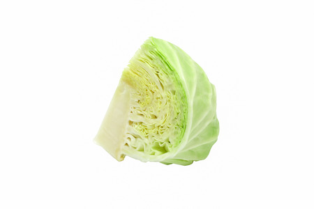 Isolated cabbage sliced on white backgroundの写真素材
