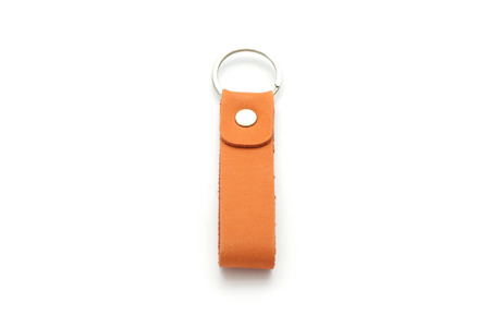 Leather key chain isolated on white backgroundの写真素材
