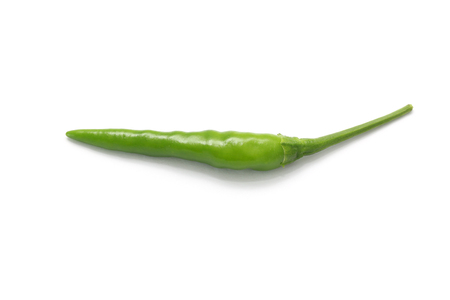 green hot chili pepper isolated on a white backgroundの写真素材