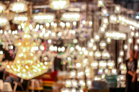 Blurred people walking siting in the float market