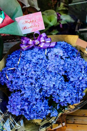 Close up hydrangea banquet with happy birthday cardの写真素材