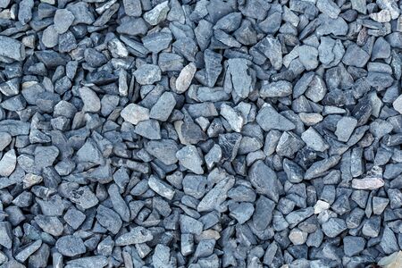 Black small road stone background, dark gravel pebbles stone texture seamless texture, granite,marbleの写真素材