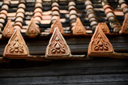 Rooftop temple decorate from earthenwareの写真素材