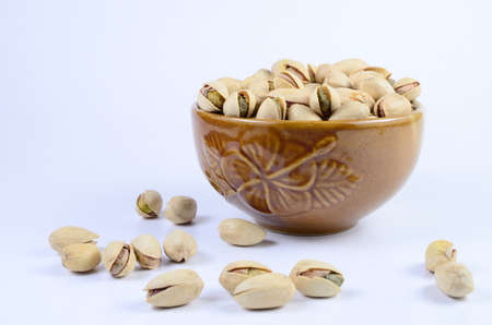 Pistachio nut in a bowlの写真素材