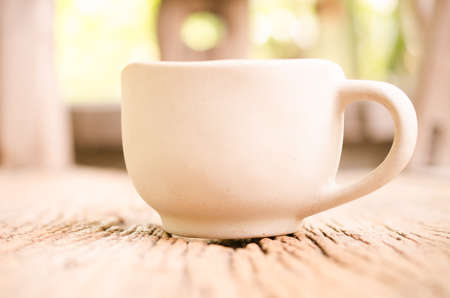 coffee cup on wooden boardの写真素材