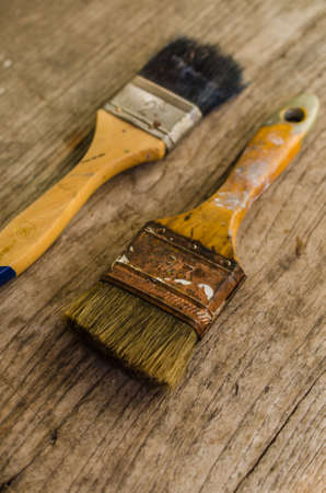 Old paintbrush on wooden background,vintage paintbrushの写真素材