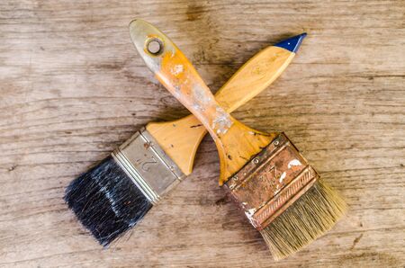 Old paintbrush on wooden background,vintage paintbrushの写真素材