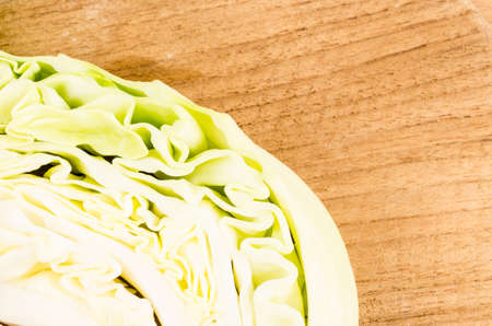 cabbage on wooden board