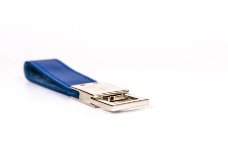 Blue leather keyring isolate on white background