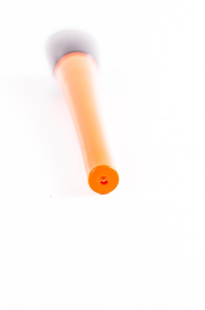 Close up of eyeliner bottle isolated on white backgroundの写真素材