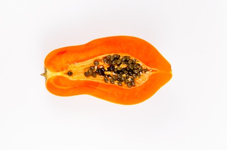 haft of fresh papaya isolated on white backgroundの写真素材
