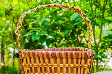 Empty wicker basket with blur backgroundの写真素材