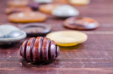 Close up group of various vintage sewing buttons