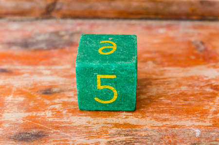 old wooden cube text