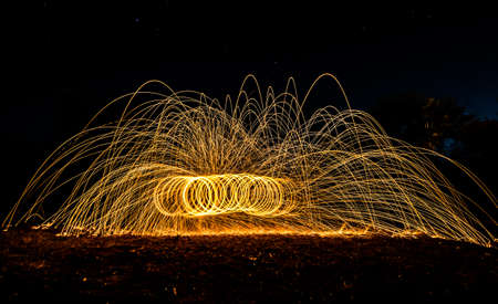 art light of fire spinning from metal woolの写真素材