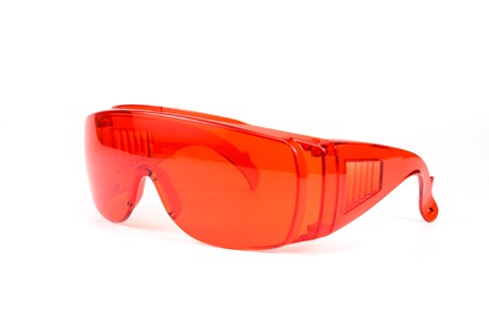 Red sunglasses isolated on white background
