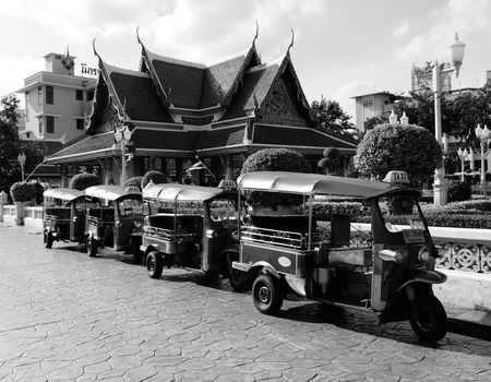 BANGKOK THAILAND, SEPTEMBER 2016 : Tuk tuk taxi parked in front of thai pavilion. Tuk tuk is the most famous taxi for tourist in Bangkok Thailandの写真素材